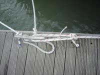 Bowline tied to a mooring cleat, this will be impossible to release under load.